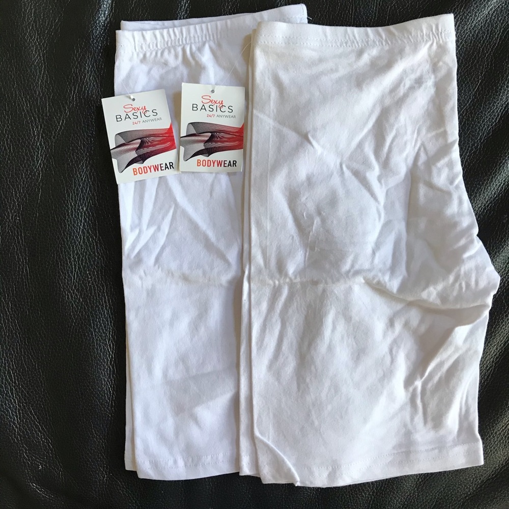 2 pair of white basics shorts
